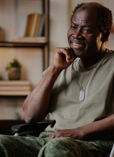 Portrait of Smiling Black Veteran with Disability